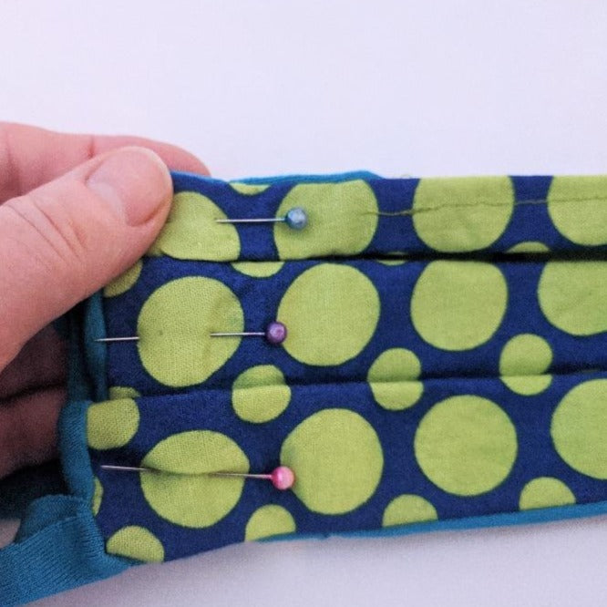 Make your own fabric face mask with our downloadable pattern