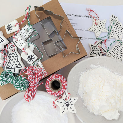 Make your own christmas decorations with cookie cutters, clay ingredients, marker and Christmas twine